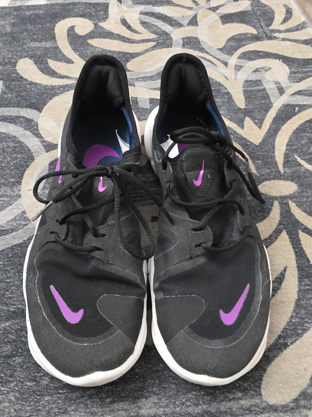 Nike Women’s Black Athletic Sneakers with Purple Swoosh